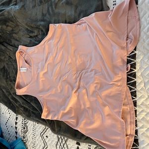 Like new yogalicious tank top. Partially open back with tie at the end.